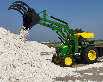 Tractor mounted cotton loaders