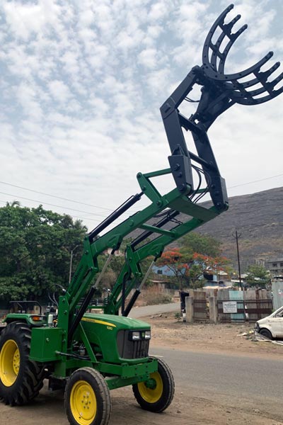 Tractor mounted front end loaders