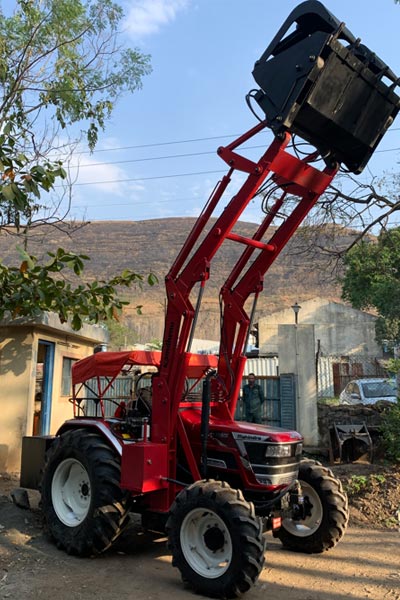 Tractor mounted front end loaders